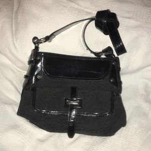 Black DKNY purse with straps